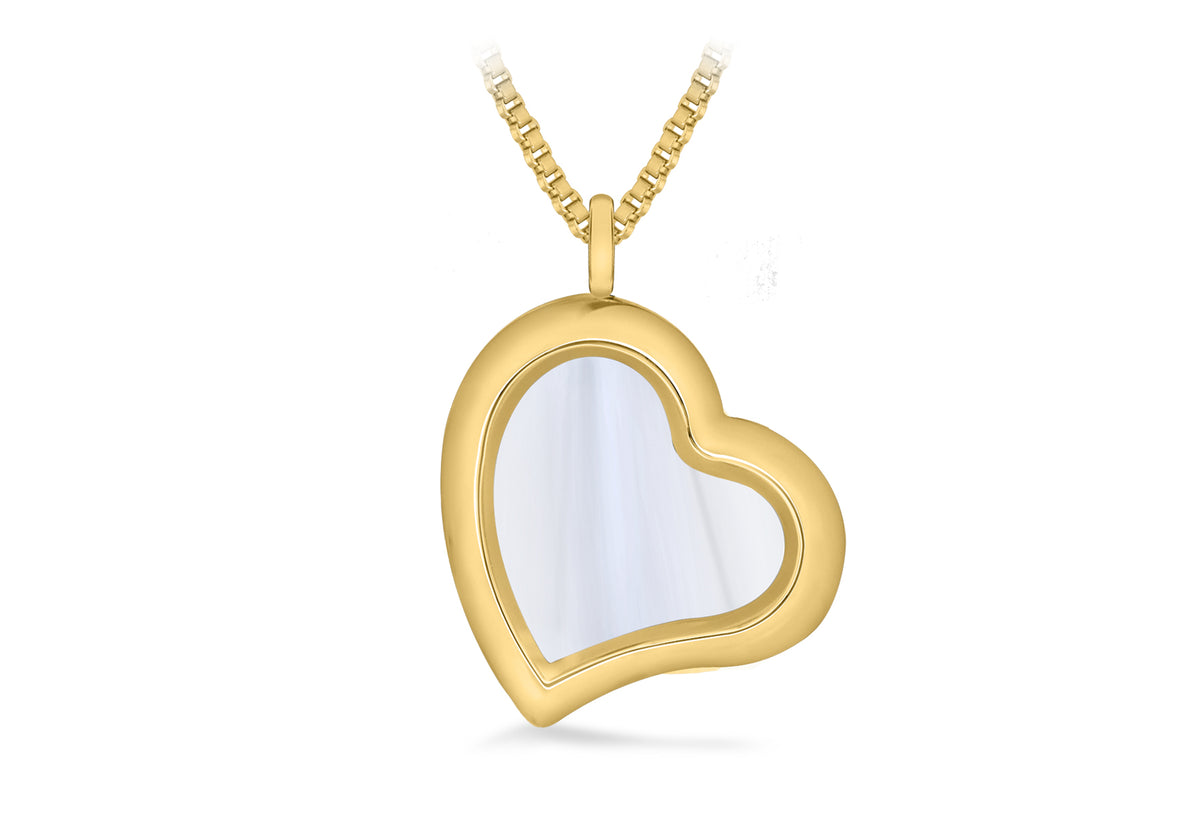 A gold heart-shaped pendant necklace with a smooth, iridescent white inlay, suspended from a gold box chain against a solid white background.