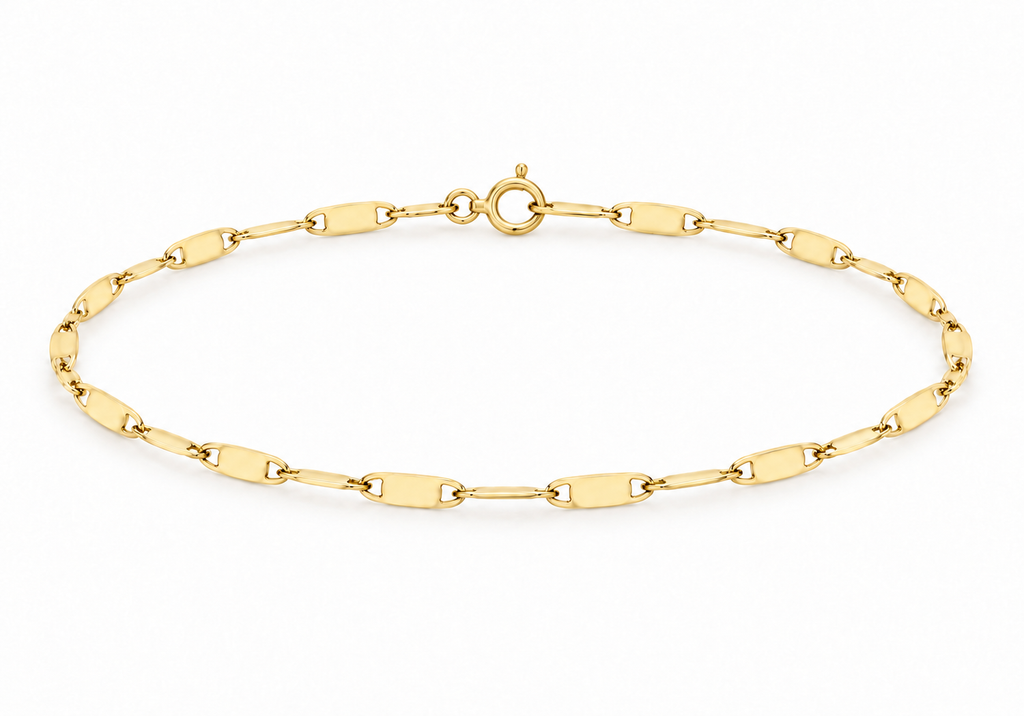 A yellow gold chain bracelet with elongated oval links and a spring-ring clasp, displayed on a clean white background.