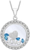 A round silver pendant necklace featuring a silver heart, blue rhinestones, the word 'Love' in silver letters, and a border of small clear stones, suspended from a silver chain.