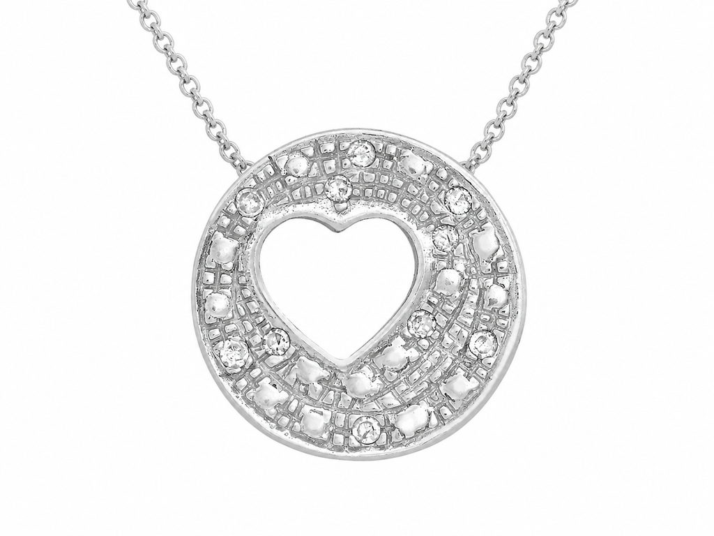 A silver-tone heart pendant necklace featuring a double halo design with clear pavé-set stones, suspended from a delicate chain against a plain white background.
