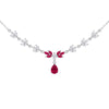 A silver-toned necklace featuring a central floral motif with three marquise-cut pink gemstones and a dangling pear-shaped pink gemstone, accented by small clear stones along the chain.
